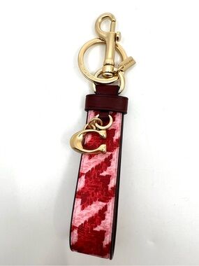 COACH Trigger Snap Bag Charm In Pink Houndstooth Print Gold Tone Hardware